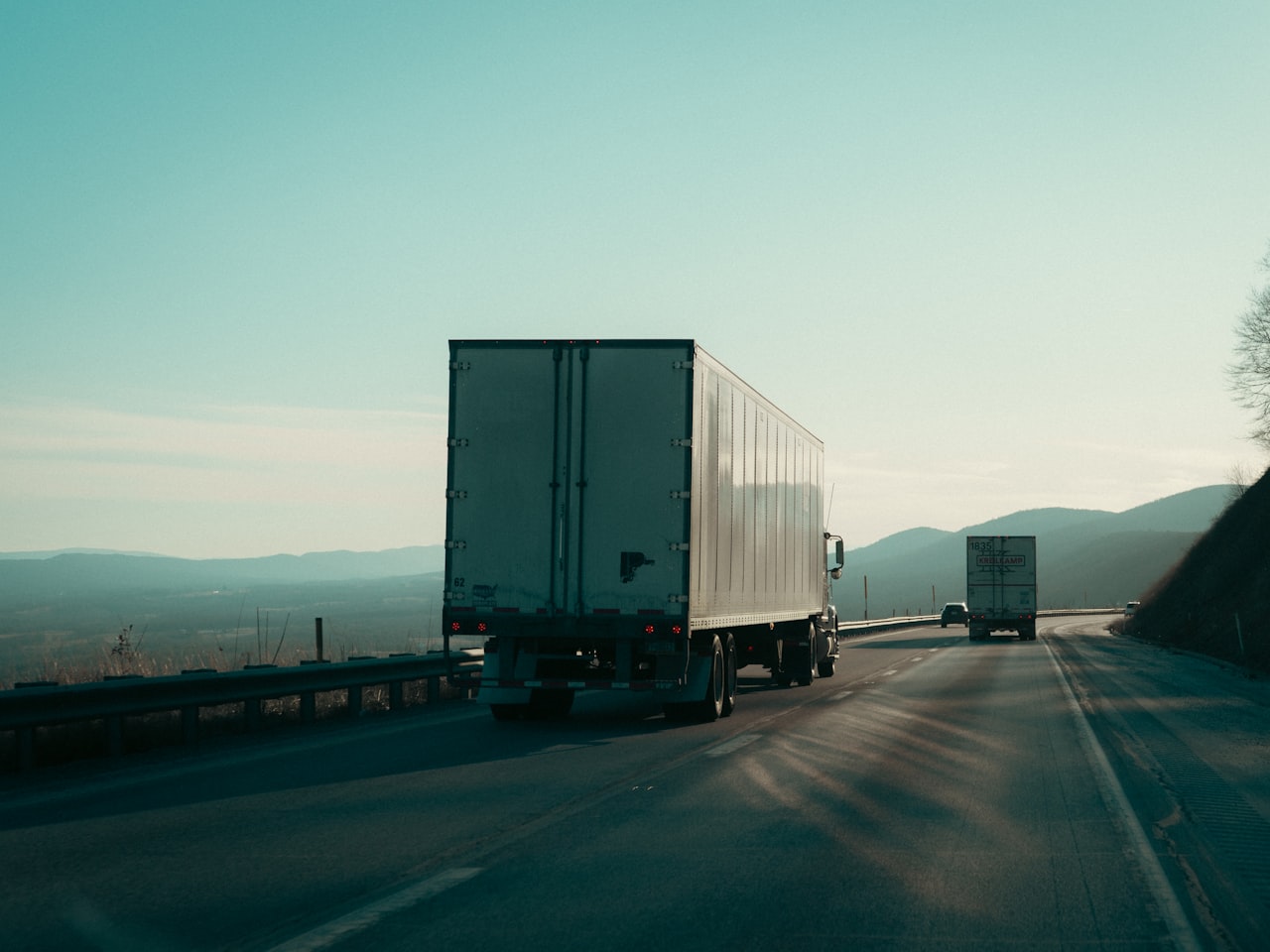Two articulated lorries on a highway