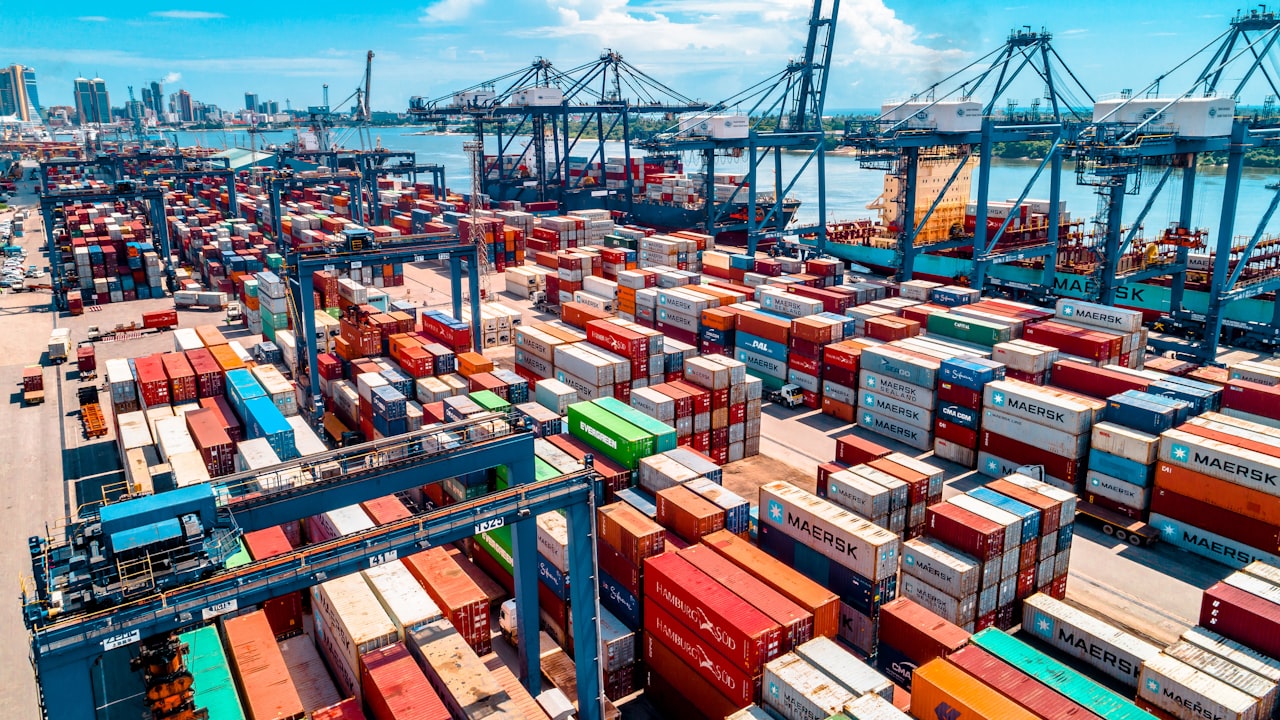 Shipping containers stacked several high at a port terminal