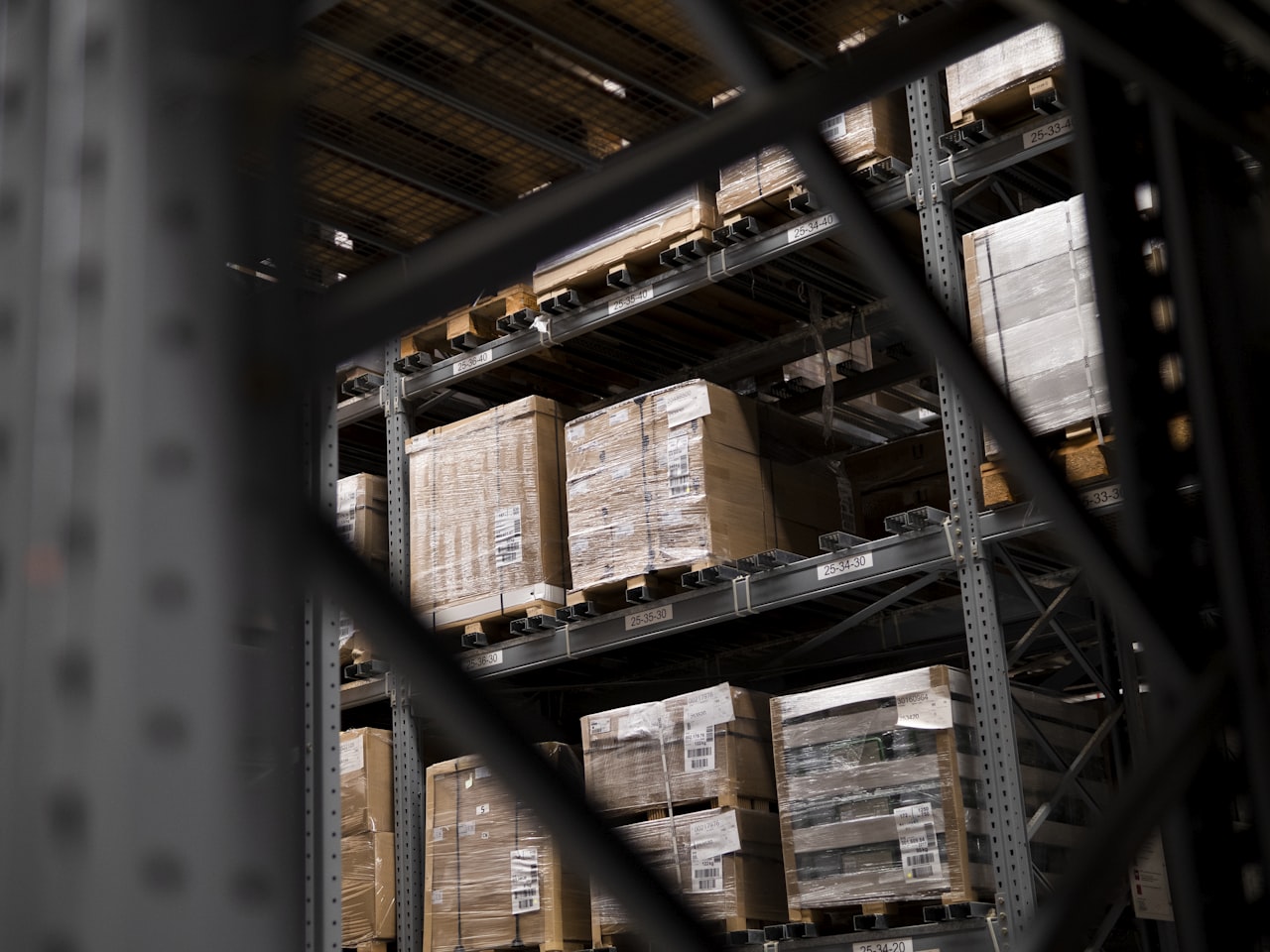 A distribution warehouse stacked with palletised goods